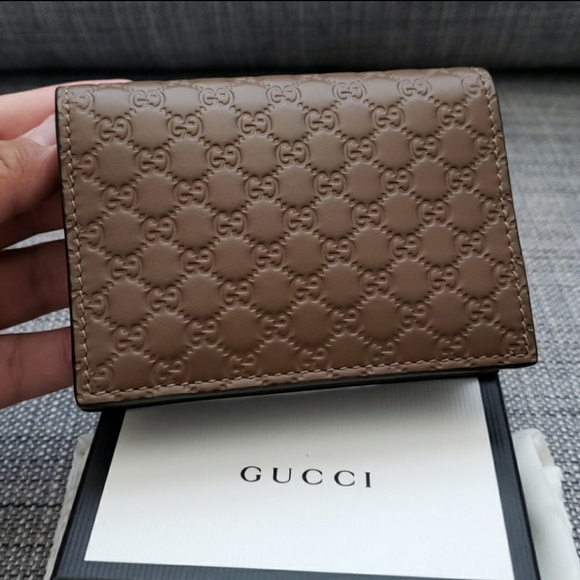 Gucci Handbags - NWT Gucci Micro guccissima GG logo wallet